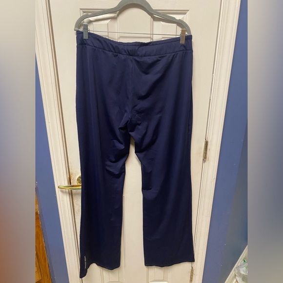Under Armour, blue track pants with slim fit, and elastic waistband XL - Picture 2 of 12